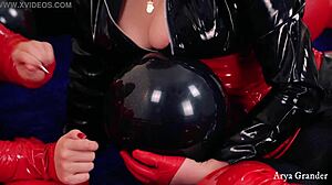 Latex-clad lovers explore their fetish for balloons in HD video